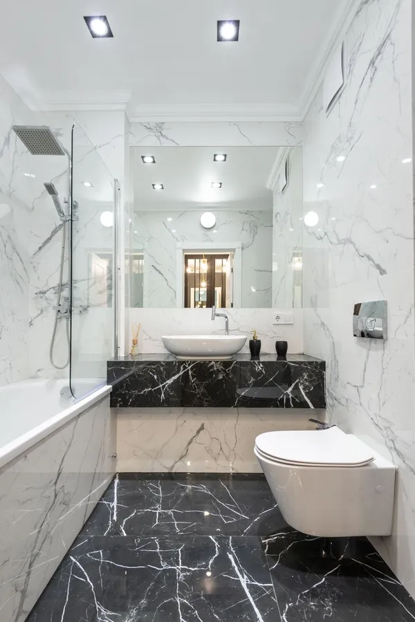 Luxurious marble-walled bathroom